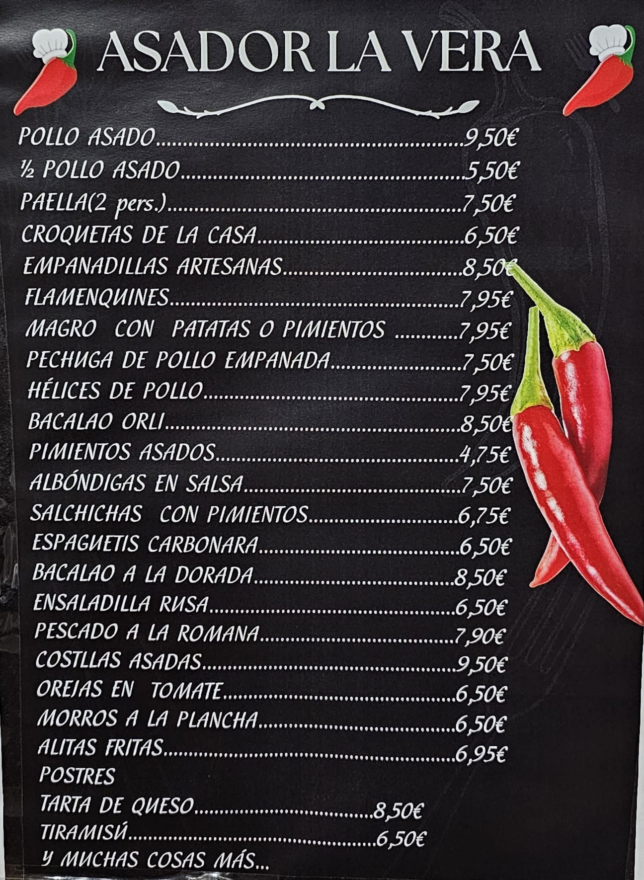 Asador de pollos en la Vera Comida para llevar